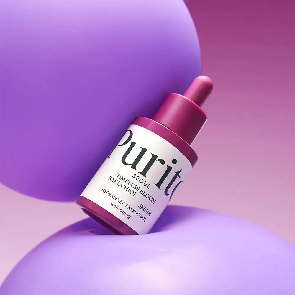 PURITO Timeless Bloom Bakuchiol Serum 30 ml in a clear glass bottle with a white pump dispenser, labeled with product branding.