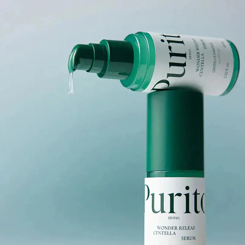 PURITO Wonder Releaf Centella Serum in 60ml bottle, featuring clear liquid and pump dispenser, designed for soothing and healing skin.