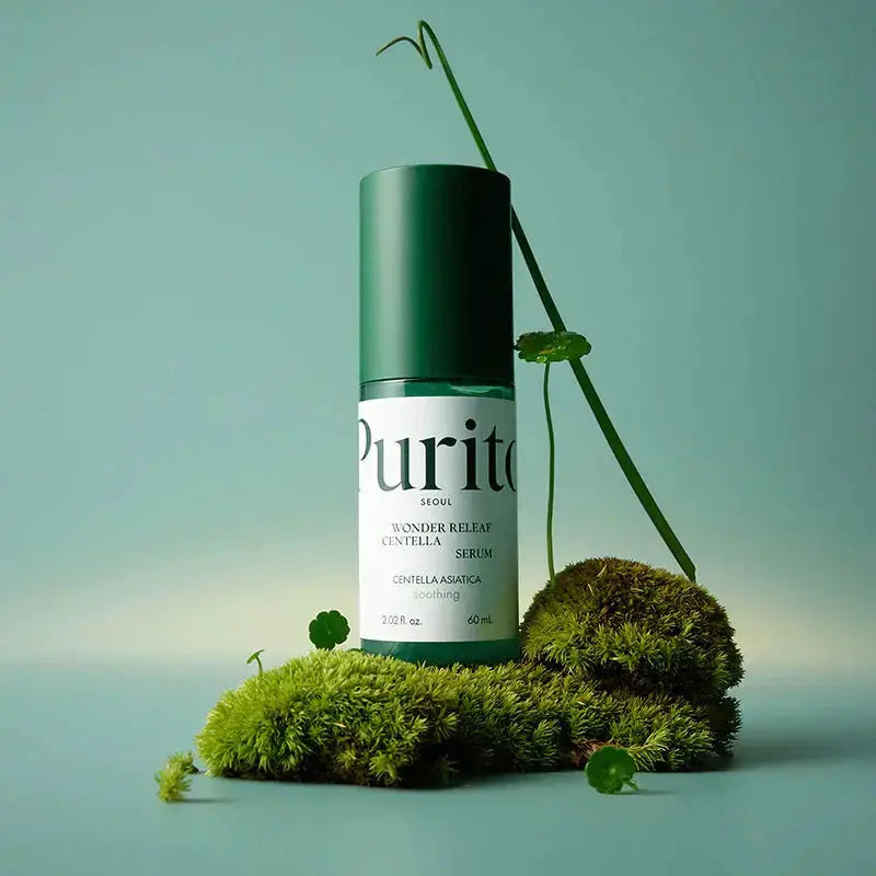 PURITO Wonder Releaf Centella Serum 60ml bottle with dropper, featuring a clear liquid and minimalist branding on the label.