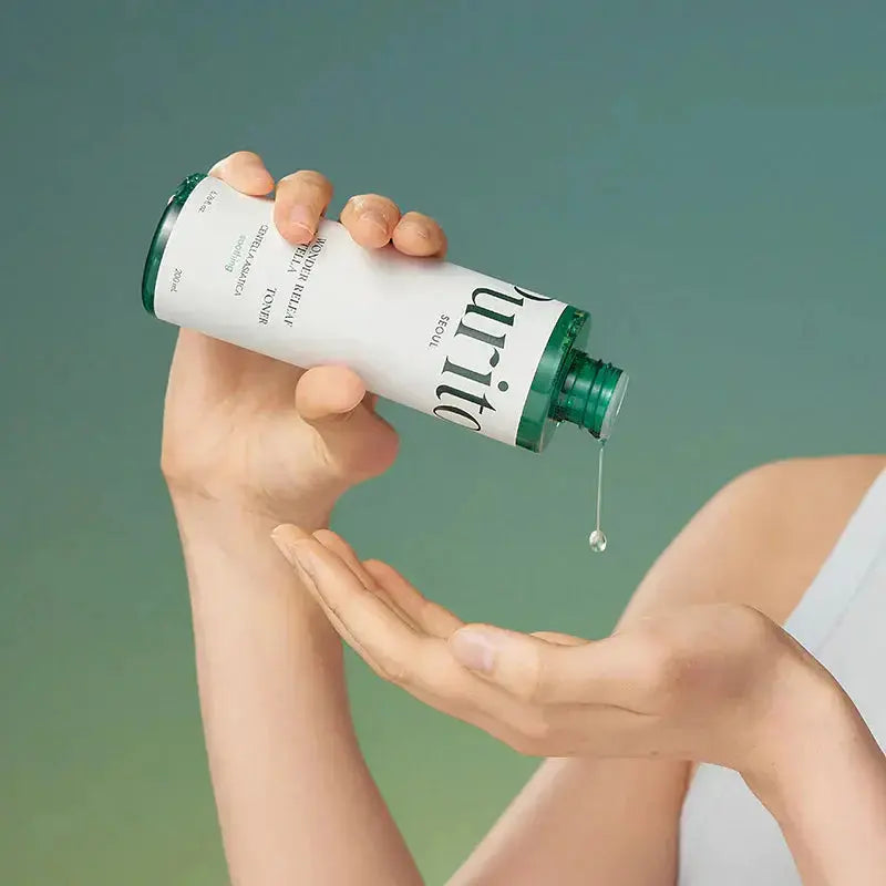 PURITO Wonder Releaf Centella Toner in a 200 ml bottle, featuring a clear liquid with a simple label, designed for soothing skincare.