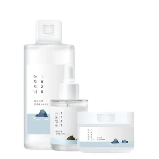 Round Lab toner, serum, and cleansing balm set with matching bottles and jars, showcasing skincare products in a clean, minimalist design.