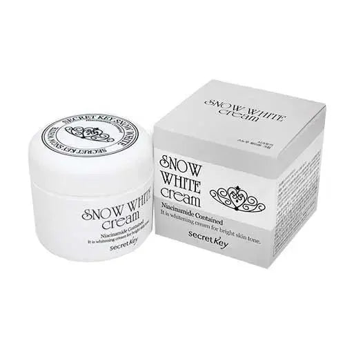 Secret Key Snow White Cream 50g brightening cream with a smooth texture and white jar, designed for skin brightening and hydration.