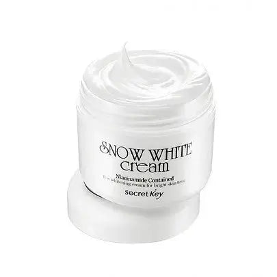 Secret Key Snow White Cream 50g brightening cream jar with white and blue packaging, designed for skin brightening and radiance.