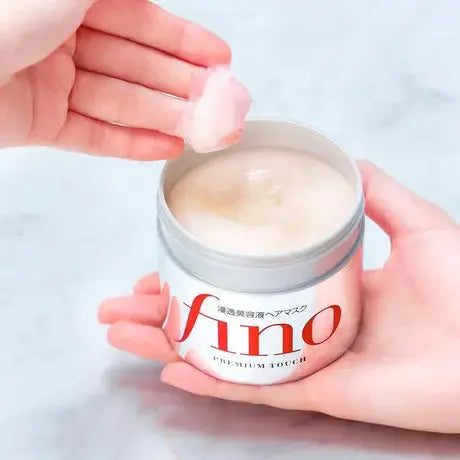 Shiseido Fino Premium Touch Hair Mask 230g jar with smooth, luxurious hair care product for deep conditioning and nourishment.