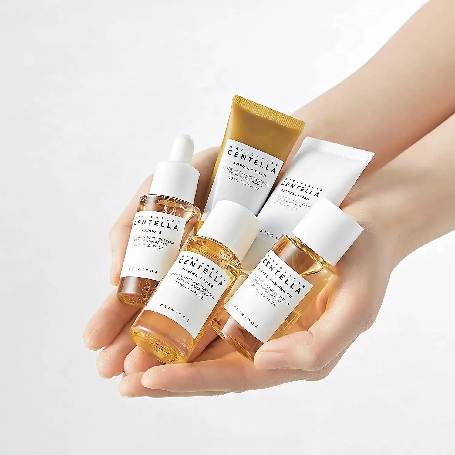 SKIN1004 Madagascar Centella Travel Kit with skincare products in travel-sized bottles and containers, ideal for on-the-go use.