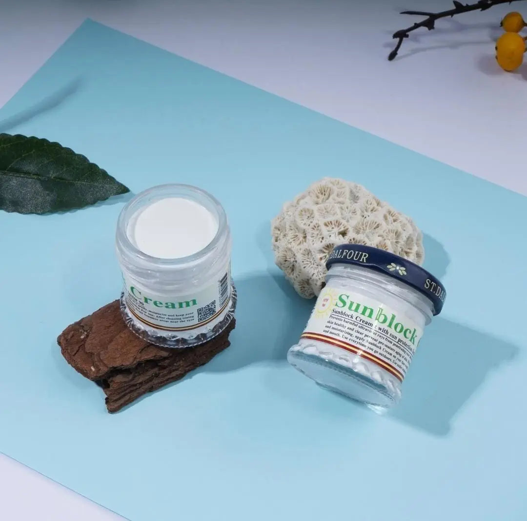 St Dalfour Sunblock Cream jar with SPF protection, white packaging, and label showing product details.