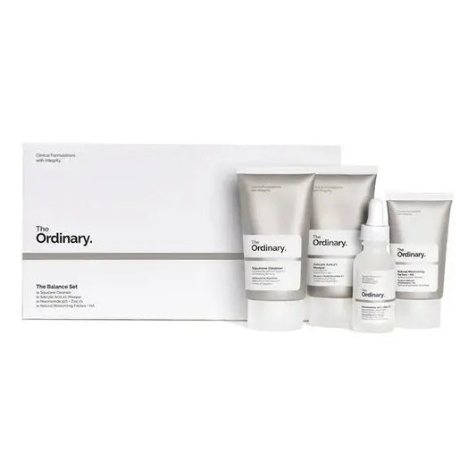 The Ordinary The Balance Set with skincare products in white bottles and tubes, arranged on a clean white background.