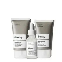 Image of THE ORDINARY The Daily Set featuring skincare products in white bottles and tubes, designed for daily skincare routines.