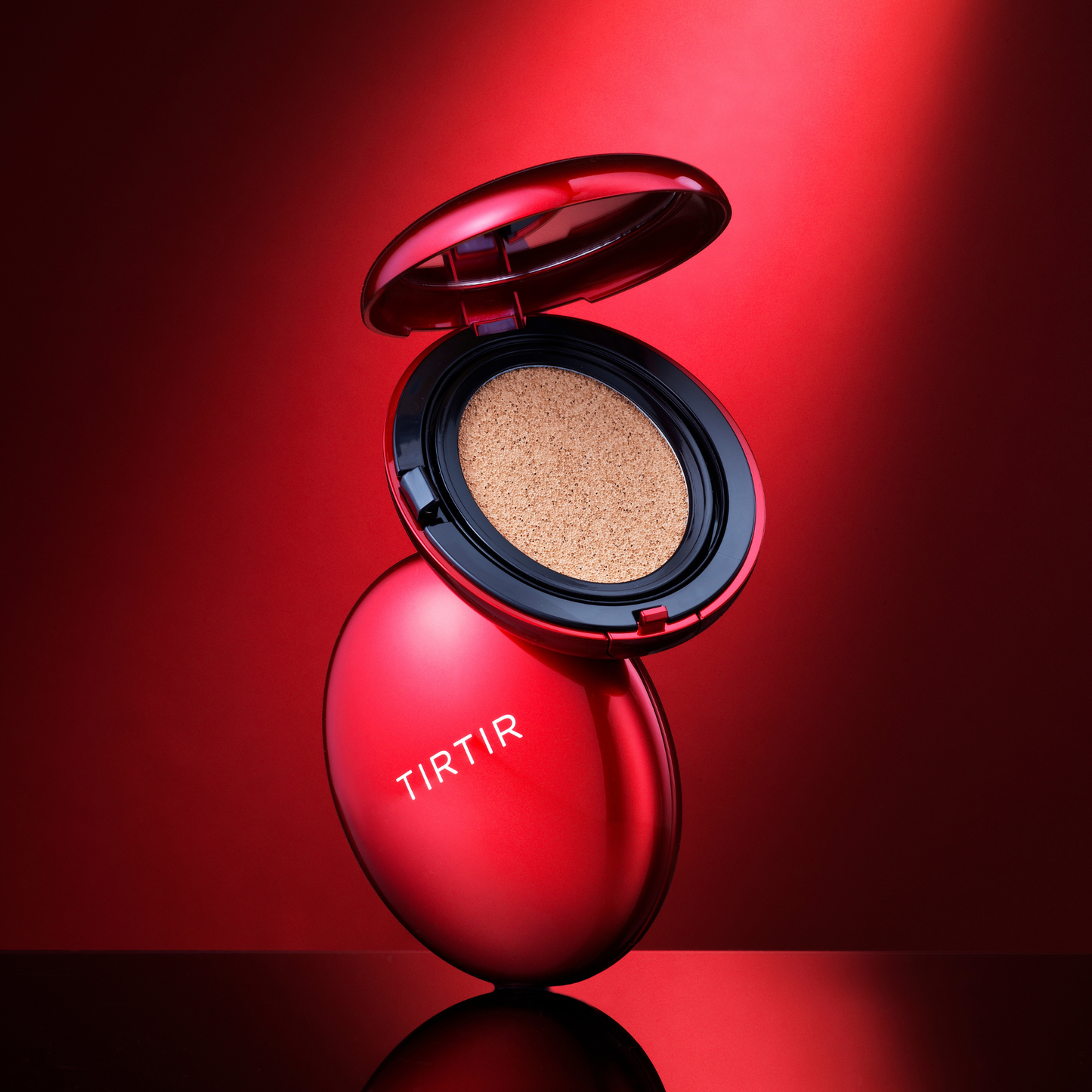TIRTIR Mask Fit Red Cushion foundation in 10C shell with a compact case, featuring a smooth, even-toned makeup finish.