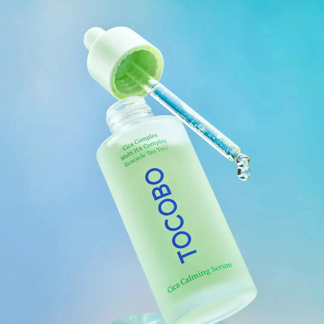 TOCOBO Cica Calming Serum 50 ml bottle, clear container showing the soothing skincare serum in a natural setting.