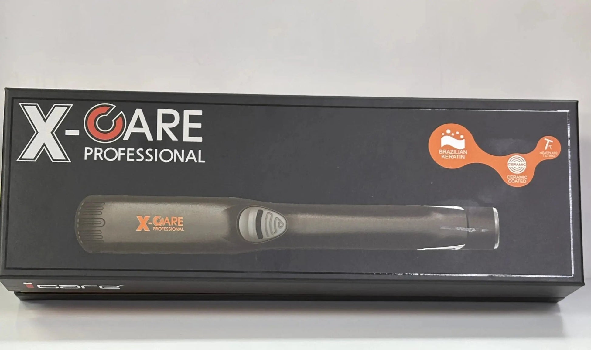 X CARE Professional Hair Straightener at 230°C, with sleek design and ceramic plates for smooth styling.